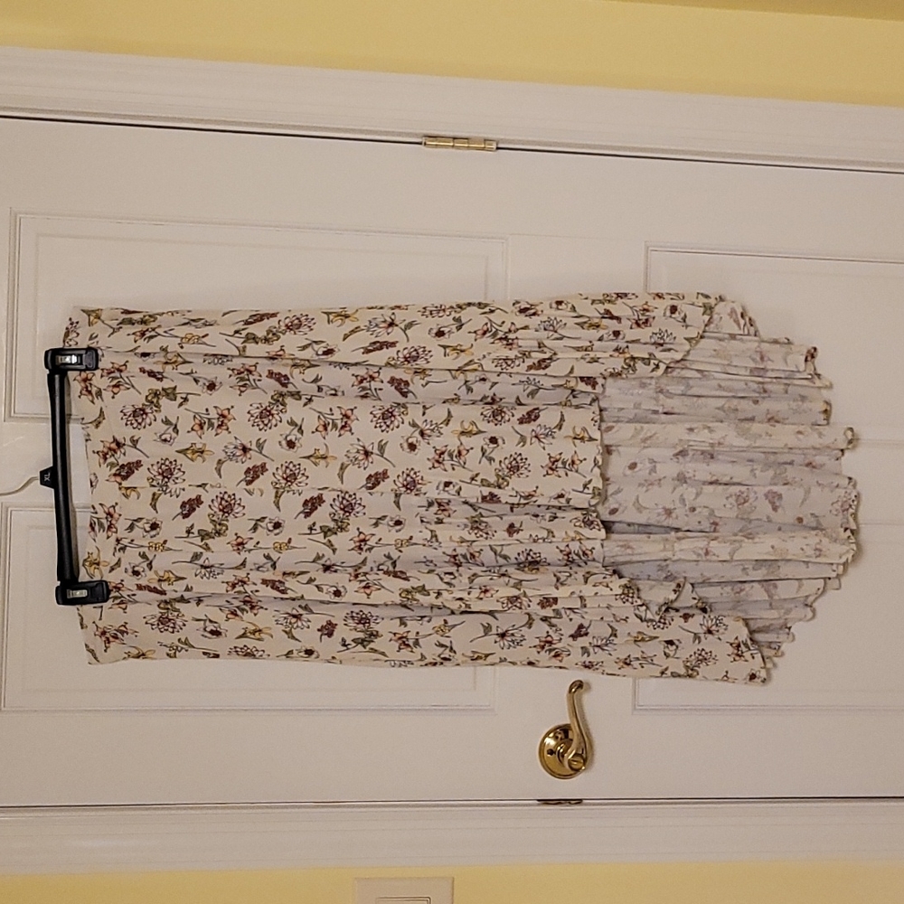 Xhilaration skirt in floral print, cream color. New with inside tag.